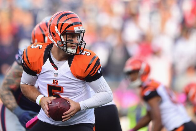 FOXBORO, MA - OCTOBER 16: AJ McCarron hands off the ball during the fourth quarter of a game against the New England Patriots at Gillette Stadium on October 16, 2016 in Foxboro, Massachusetts.  (Photo by Billie Weiss/Getty Images)