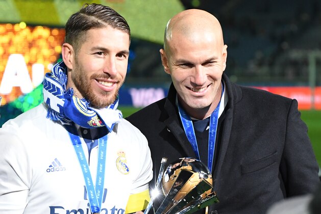 YOKOHAMA, JAPAN - DECEMBER 18:  Sergio Ramos and Zinedine Zidane of Real Madrid look on after the FIFA Club World Cup final match between Real Madrid and Kashima Antlers at International Stadium Yokohama on December 18, 2016 in Yokohama, Japan.  (Photo by Masashi Hara/Getty Images)