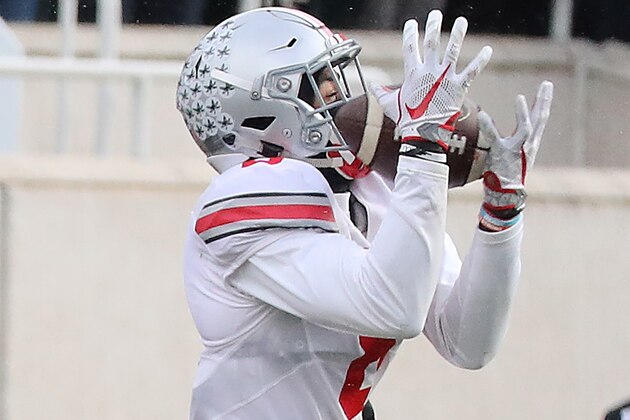 EAST LANSING, MI - NOVEMBER 19: Gareon Conley #8 of the Ohio State Buckeyes intercepts the pass from Tyler O'Connor #7 of the Michigan State Spartans (not in photo) during the fourth quarter at Spartan Stadium on November 19, 2016 in East Lansing, Michigan. Ohio State defeated Michigan State 17-16. (Photo by Leon Halip/Getty Images)