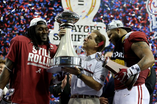 ATLANTA, GA - DECEMBER 31:  Head Coach Nick Saban of the Alabama Crimson Tide celebrates with offensive player of the game Bo Scarbrough #9 of the Alabama Crimson Tide and defensive play of the game Ryan Anderson #22 of the Alabama Crimson Tide after winning 24 to 7 against the Washington Huskies during the 2016 Chick-fil-A Peach Bowl at the Georgia Dome on December 31, 2016 in Atlanta, Georgia.  (Photo by Streeter Lecka/Getty Images)