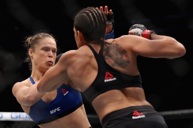 LAS VEGAS, NV - DECEMBER 30:  (L-R) Ronda Rousey and Amanda Nunes of Brazil face off in their UFC women's bantamweight championship bout during the UFC 207 event at T-Mobile Arena on December 30, 2016 in Las Vegas, Nevada.  (Photo by Christian Petersen/Getty Images)