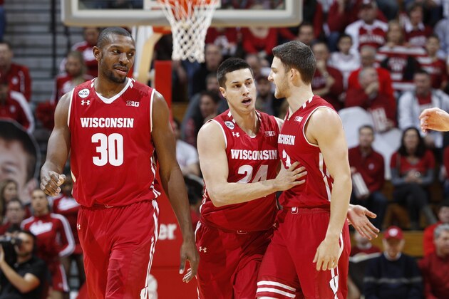 BLOOMINGTON, IN - JANUARY 03: Bronson Koenig #24 of the Wisconsin Badgers celebrates with Vitto Brown #30 and Zak Showalter #3 after hitting a three-point shot against the Indiana Hoosiers in the first half of the game at Assembly Hall on January 3, 2017 in Bloomington, Indiana. (Photo by Joe Robbins/Getty Images)