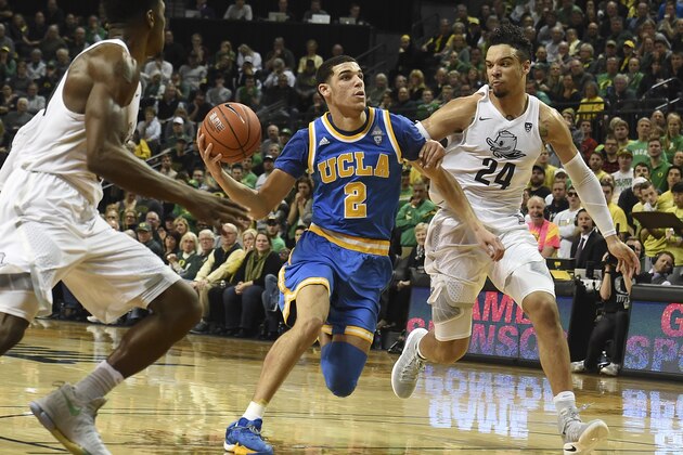 EUGENE, OR - DECEMBER 28: Lonzo Ball #2 of the UCLA Bruins tries to get around Dillon Brooks #24 of the Oregon Ducks late in the game at Matthew Knight Arena on December 28, 2016 in Eugene, Oregon.  (Photo by Steve Dykes/Getty Images)