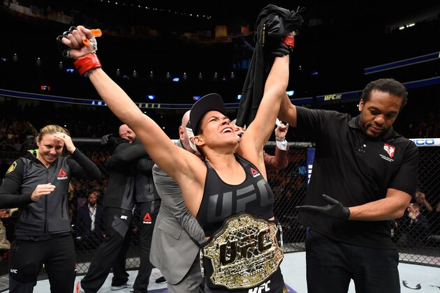LAS VEGAS, NV - DECEMBER 30:  Amanda Nunes of Brazil reacts to her victory over Ronda Rousey in their UFC women's bantamweight championship bout during the UFC 207 event at T-Mobile Arena on December 30, 2016 in Las Vegas, Nevada.  (Photo by Josh Hedges/Zuffa LLC/Zuffa LLC via Getty Images)