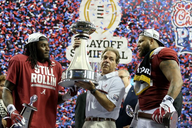 ATLANTA, GA - DECEMBER 31:  Head Coach Nick Saban of the Alabama Crimson Tide celebrates with offensive player of the game Bo Scarbrough #9 of the Alabama Crimson Tide and defensive play of the game Ryan Anderson #22 of the Alabama Crimson Tide after winning 24 to 7 against the Washington Huskies during the 2016 Chick-fil-A Peach Bowl at the Georgia Dome on December 31, 2016 in Atlanta, Georgia.  (Photo by Streeter Lecka/Getty Images)