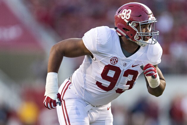 FAYETTEVILLE, AR - OCTOBER 8:  Jonathan Allen #93 of the Alabama Crimson Tide at the line of scrimmage during a game against the Arkansas Razorbacks at Razorback Stadium on October 8, 2016 in Fayetteville, Arkansas.  The Crimson Tide defeated the Razorbacks 49-30.  (Photo by Wesley Hitt/Getty Images)