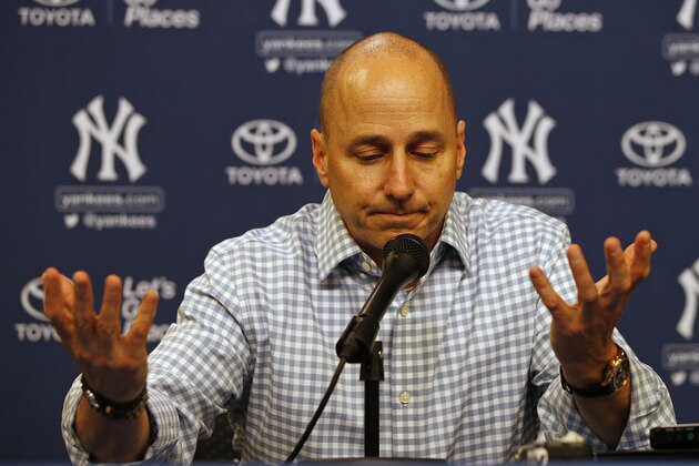 NEW YORK, NY - AUGUST 01: Brian Cashman, general manager of the New York Yankees, talks during a press conference before a game against the New York Mets at Citi Field on August 1, 2016 in the Flushing neighborhood of the Queens borough of New York City. (Photo by Rich Schultz/Getty Images)
