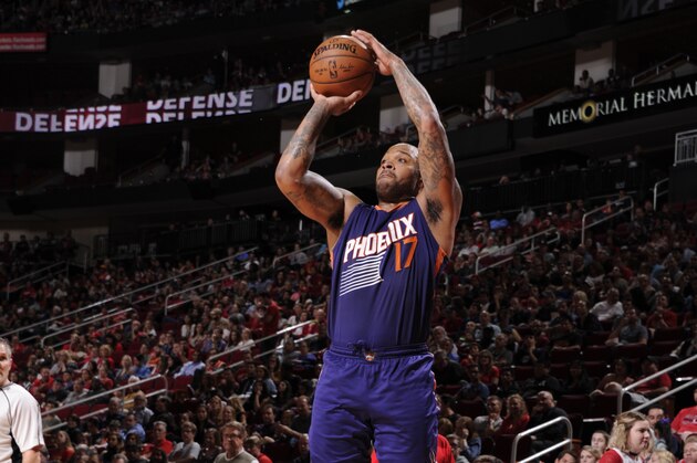 HOUSTON, TX - DECEMBER 26:  P.J. Tucker #17 of the Phoenix Suns shoots the ball against the Houston Rockets during the game on December 26, 2016 at the Toyota Center in Houston, Texas. NOTE TO USER: User expressly acknowledges and agrees that, by downloading and or using this photograph, User is consenting to the terms and conditions of the Getty Images License Agreement. Mandatory Copyright Notice: Copyright 2016 NBAE (Photo by Bill Baptist/NBAE via Getty Images)