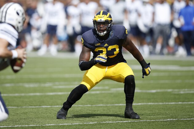ANN ARBOR, MI - SEPTEMBER 26: Taco Charlton #33 of the Michigan Wolverines in action against the BYU Cougars during a game at Michigan Stadium on September 26, 2015 in Ann Arbor, Michigan. The Wolverines defeated the Cougars 31-0. (Photo by Joe Robbins/Getty Images)