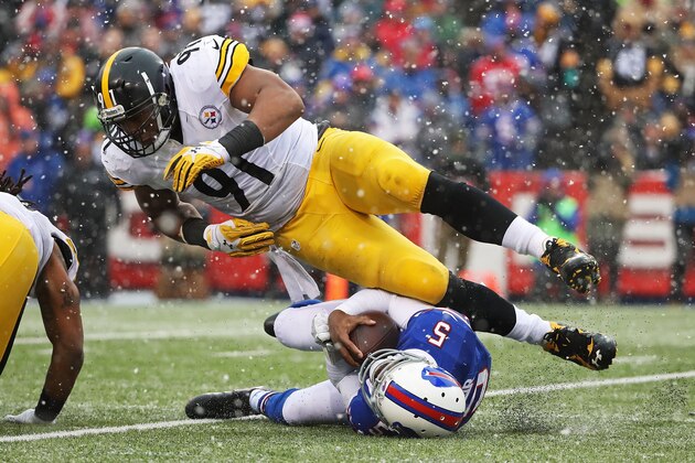 ORCHARD PARK, NY - DECEMBER 11:   Stephon Tuitt #91 of the Pittsburgh Steelers tackles Tyrod Taylor #5 of the Buffalo Bills during the second half at New Era Field on December 11, 2016 in Orchard Park, New York.  (Photo by Tom Szczerbowski/Getty Images)