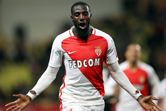 Monaco's French midfielder Tiemoue Bakayoko celebrates after scoring a goal during the French L1 football match between Monaco (ASM) and Caen (SMC) on December 21, 2016 at the Louis II Stadium in Monaco. / AFP / VALERY HACHE        (Photo credit should read VALERY HACHE/AFP/Getty Images)