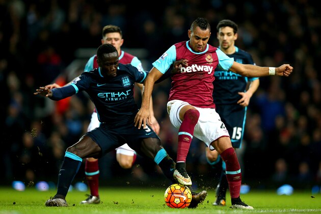 LONDON, ENGLAND - JANUARY 23: Dimitri Payet of West Ham United is challenged by Bacary Sagna of Manchester City during the Barclays Premier League match between West Ham United and Manchester City at the Boleyn Ground on January 23, 2016 in London, England. (Photo by Paul Gilham/Getty Images) LONDON, ENGLAND - JANUARY 23: Dimitri Payet of West Ham United is challenged by Bacary Sagna of Manchester City during the Barclays Premier League match between West Ham United and Manchester City at the Boleyn Ground on January 23, 2016 in London, England. (Photo by Paul Gilham/Getty Images)