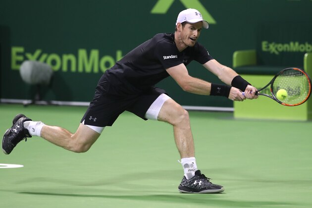 Britain's Andy Murray reacts as he plays against Austria's Gerald Melzer during the second round of the ATP Qatar Open tennis competition in Doha on January 4, 2017. / AFP / KARIM JAAFAR        (Photo credit should read KARIM JAAFAR/AFP/Getty Images)