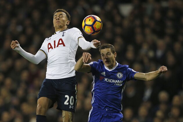 Tottenham Hotspur's English midfielder Dele Alli (L) vies with Chelsea's Spanish defender Cesar Azpilicueta during the English Premier League football match between Tottenham Hotspur and Chelsea at White Hart Lane in London, on January 4, 2017. / AFP / Adrian DENNIS / RESTRICTED TO EDITORIAL USE. No use with unauthorized audio, video, data, fixture lists, club/league logos or 'live' services. Online in-match use limited to 75 images, no video emulation. No use in betting, games or single club/league/player publications.  /         (Photo credit should read ADRIAN DENNIS/AFP/Getty Images)