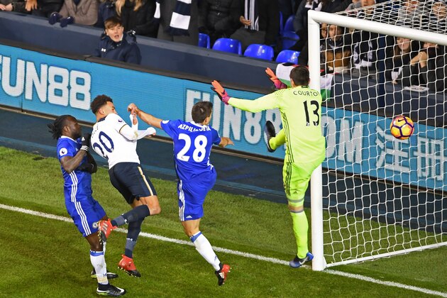 LONDON, ENGLAND - JANUARY 04: Dele Alli of Tottenham Hotspur (L) scores his sides second goal with a header during the Premier League match between Tottenham Hotspur and Chelsea at White Hart Lane on January 4, 2017 in London, England.  (Photo by Mike Hewitt/Getty Images)