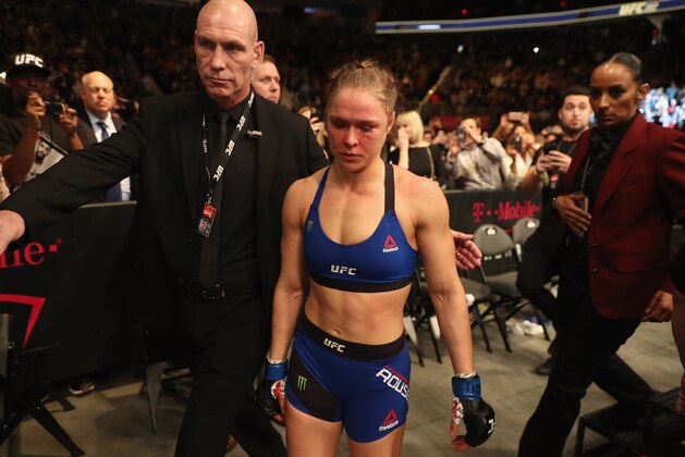 LAS VEGAS, NV - DECEMBER 30: Ronda Rousey exits the Octagon after her loss to Amanda Nunes of Brazil in their UFC women's bantamweight championship bout during the UFC 207 event on December 30, 2016 in Las Vegas, Nevada.  (Photo by Christian Petersen/Getty Images)