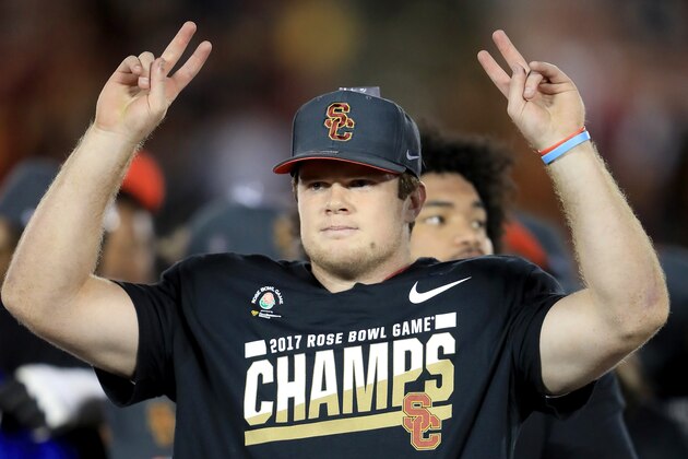 PASADENA, CA - JANUARY 02:  Quarterback Sam Darnold #14 of the USC Trojans celebrates after defeating the Penn State Nittany Lions 52-49 to win the 2017 Rose Bowl Game presented by Northwestern Mutual at the Rose Bowl on January 2, 2017 in Pasadena, California.  (Photo by Sean M. Haffey/Getty Images)