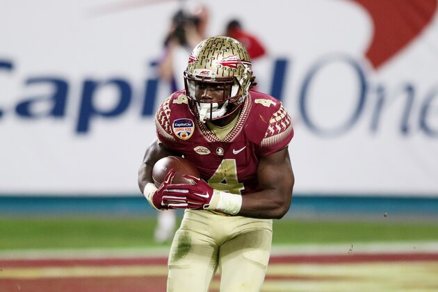 MIAMI GARDENS, FL - DECEMBER 30:  Dalvin Cook #4 of the Florida State Seminoles carries the ball in the second half against the Michigan Wolverines during the Capitol One Orange Bowl at Sun Life Stadium on December 30, 2016 in Miami Gardens, Florida.  (Photo by Marc Serota/Getty Images)