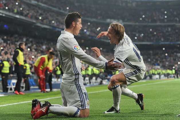 MADRID, SPAIN - JANUARY 04:  James Rodriguez of Real Madrid celebrates with Luka Modric after scoring Real's 3rd goal during the Copa del Rey Round of 16 First Leg match between Real Madrid and Sevilla  at Bernabeu on January 4, 2017 in Madrid, Spain.  (Photo by Denis Doyle/Getty Images)