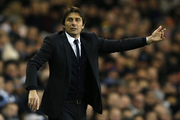 Chelsea's Italian head coach Antonio Conte gestures on the touchline during the English Premier League football match between Tottenham Hotspur and Chelsea at White Hart Lane in London, on January 4, 2017.
In-form midfielder Dele Alli scored two near-identical headers as Tottenham Hotspur beat Chelsea 2-0 on Wednesday to torpedo the Premier League leaders' hopes of a record 14th consecutive victory. / AFP / Adrian DENNIS / RESTRICTED TO EDITORIAL USE. No use with unauthorized audio, video, data, fixture lists, club/league logos or 'live' services. Online in-match use limited to 75 images, no video emulation. No use in betting, games or single club/league/player publications.  /         (Photo credit should read ADRIAN DENNIS/AFP/Getty Images)