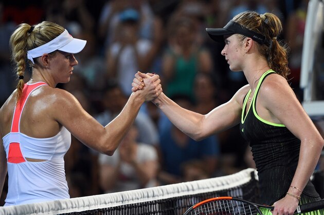 Elina Svitolina of Ukraine (R) shakes hands after defeating Angelique Kerber of Germany after their women's singles quarter-final match at the Brisbane International tennis tournament in Brisbane on January 5, 2017. / AFP / SAEED KHAN / IMAGE RESTRICTED TO EDITORIAL USE - STRICTLY NO COMMERCIAL USE        (Photo credit should read SAEED KHAN/AFP/Getty Images)