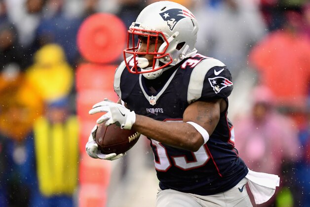 FOXBORO, MA - DECEMBER 24:  Dion Lewis #33 of the New England Patriots carries the ball during the first quarter of a game against the New York Jets at Gillette Stadium on December 24, 2016 in Foxboro, Massachusetts.  (Photo by Billie Weiss/Getty Images)