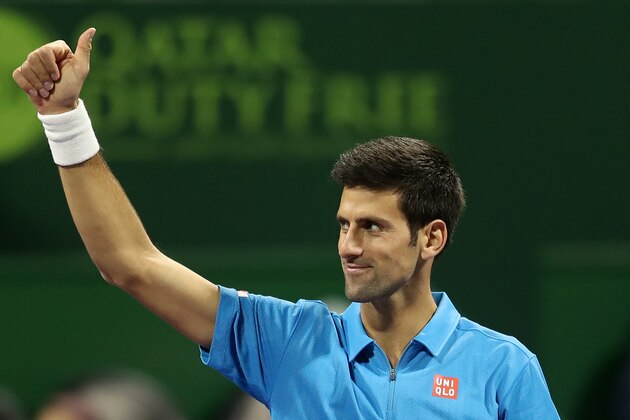Serbia's Novak Djokovic celebrates after beating Czech Republic's Radek Stepanek during the quarter-final of the ATP Qatar Open tennis competition in Doha on January 5, 2017. / AFP / KARIM JAAFAR        (Photo credit should read KARIM JAAFAR/AFP/Getty Images)