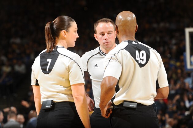 OAKLAND, CA - APRIL 5:  Referees Lauren Holtkamp #7 and Tom Washington #49 huddle up during the Minnesota Timberwolves game against the Golden State Warriors on April 5, 2016 at Oracle Arena in Oakland, California. NOTE TO USER: User expressly acknowledges and agrees that, by downloading and or using this photograph, user is consenting to the terms and conditions of Getty Images License Agreement. Mandatory Copyright Notice: Copyright 2016 NBAE (Photo by Noah Graham/NBAE via Getty Images)