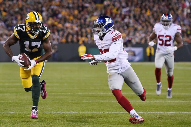 GREEN BAY, WI - OCTOBER 09:  Davante Adams #17 of the Green Bay Packers scores a touchdown in front of Michael Hunter #39 of the New York Giants during the first half of a game at Lambeau Field on October 9, 2016 in Green Bay, Wisconsin. The Packers defeated the Giants 23-16.  (Photo by Stacy Revere/Getty Images)