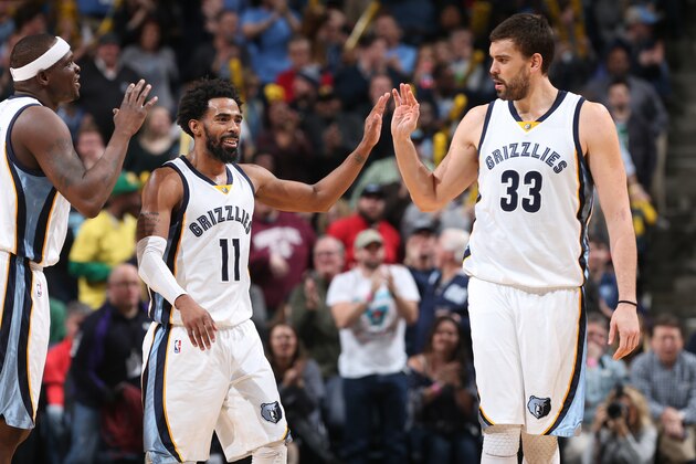 MEMPHIS, TN - DECEMBER 20:  Mike Conley #11 and Marc Gasol #33 of the Memphis Grizzlies high-five during a game against the Boston Celtics on December 20, 2016 at FedExForum in Memphis, Tennessee. NOTE TO USER: User expressly acknowledges and agrees that, by downloading and/or using this photograph, user is consenting to the terms and conditions of the Getty Images License Agreement. Mandatory Copyright Notice: Copyright 2016 NBAE (Photo by Joe Murphy/NBAE via Getty Images)