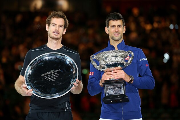 MELBOURNE, AUSTRALIA - JANUARY 31:  Australian Open runner-up Andy Murray of Great Britain stands beside winner Novak Djokovic of Serbia who holds the Norman Brookes Challenge Cup after the Men's Singles Final during day 14 of the 2016 Australian Open at Melbourne Park on January 31, 2016 in Melbourne, Australia.  (Photo by Cameron Spencer/Getty Images)