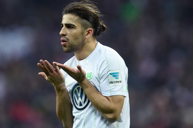 Wolfsburg's Swiss defender Ricardo Rodriguez reacts during the German first division Bundesliga football match between FC Bayern Munich and Wolfsburg in Munich, southern Germany, on December 10, 2016.  / AFP / CHRISTOF STACHE / RESTRICTIONS: DURING MATCH TIME: DFL RULES TO LIMIT THE ONLINE USAGE TO 15 PICTURES PER MATCH AND FORBID IMAGE SEQUENCES TO SIMULATE VIDEO. == RESTRICTED TO EDITORIAL USE == FOR FURTHER QUERIES PLEASE CONTACT DFL DIRECTLY AT + 49 69 650050
        (Photo credit should read CHRISTOF STACHE/AFP/Getty Images)