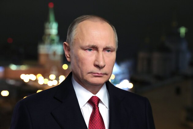 Russian President Vladimir Putin makes his New Year's address to the nation in Moscow's Kremlin, December 31, 2016. / AFP / Sputnik / Mikhail KLIMENTIEV        (Photo credit should read MIKHAIL KLIMENTIEV/AFP/Getty Images)