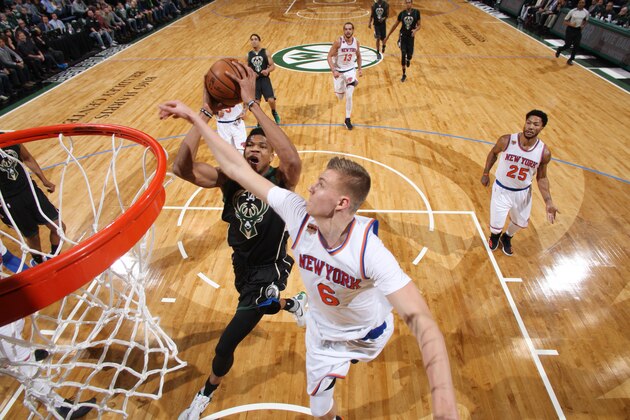 Milwaukee, WI - JANUARY 6: Giannis Antetokounmpo #34 of the Milwaukee Bucks shoots the ball against Kristaps Porzingis #6 of the New York Knicks during the game on January 6, 2017 at the BMO Harris Bradley Center in Milwaukee, Wisconsin. NOTE TO USER: User expressly acknowledges and agrees that, by downloading and or using this Photograph, user is consenting to the terms and conditions of the Getty Images License Agreement. Mandatory Copyright Notice: Copyright 2017 NBAE (Photo by Gary Dineen/NBAE via Getty Images) Milwaukee, WI - JANUARY 6: Giannis Antetokounmpo #34 of the Milwaukee Bucks shoots the ball against Kristaps Porzingis #6 of the New York Knicks during the game on January 6, 2017 at the BMO Harris Bradley Center in Milwaukee, Wisconsin. NOTE TO USER: User expressly acknowledges and agrees that, by downloading and or using this Photograph, user is consenting to the terms and conditions of the Getty Images License Agreement. Mandatory Copyright Notice: Copyright 2017 NBAE (Photo by Gary Dineen/NBAE via Getty Images)