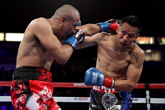 CARSON, CA - JUNE 04:  Francisco Vargas (R) dodges a right to the head by Orlando Salido during their WBC super featherweight championship bout at StubHub Center on June 4, 2016 in Carson, California.  (Photo by Sean M. Haffey/Getty Images)