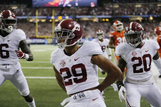 Alabama defensive back Minkah Fitzpatrick (29) celebrates his touchdown off an interception against Florida during the first half of the Southeastern Conference championship NCAA college football game, Saturday, Dec. 3, 2016, in Atlanta.(AP Photo/John Bazemore)