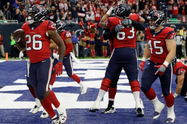HOUSTON, TX - DECEMBER 18:  Lamar Miller #26 of the Houston Texans celebrates his score along with Jay Prosch #45 at NRG Stadium on December 18, 2016 in Houston, Texas.  (Photo by Bob Levey/Getty Images)