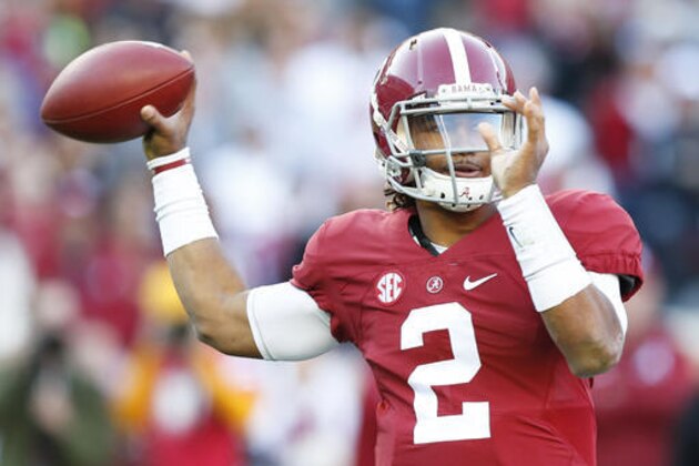 Alabama quarterback Jalen Hurts sets back to pass the ball during the first half of the Iron Bowl NCAA college football game, Saturday, Nov. 26, 2016, in Tuscaloosa, Ala. (AP Photo/Brynn Anderson)