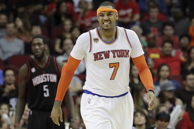 HOUSTON, TX - DECEMBER 31: Carmelo Anthony #7 of the New York Knicks reacts after a shot in the first half against the Houston Rockets at Toyota Center on December 31, 2016 in Houston, Texas. NOTE TO USER: User expressly acknowledges and agrees that, by downloading and or using this photograph, User is consenting to the terms and conditions of the Getty Images License Agreement. (Photo by Tim Warner/Getty Images)
