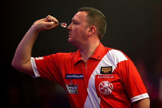 FRIMLEY, ENGLAND - JANUARY 10: Glen Durrant of England in action during his semi final match against Martin Adams of England during the BDO Lakeside World Professional Darts Championships on Day Eight at The Lakeside Country Club on January 10, 2015 in Frimley, England. (Photo by Charlie Crowhurst/Getty Images)
