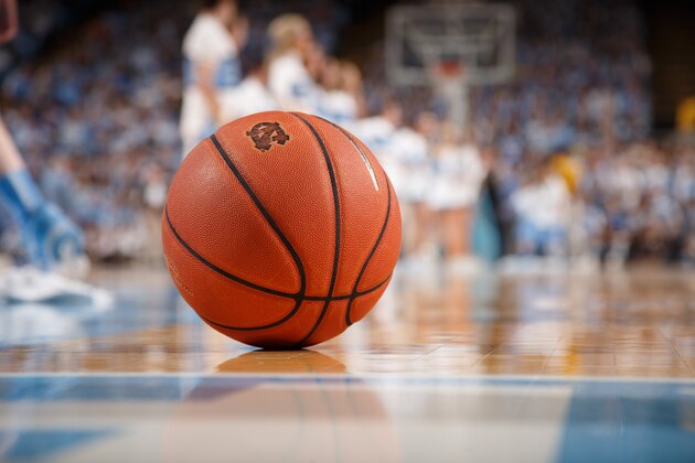 CHAPEL HILL, NC - JANUARY 26: A general view of a basketball with the logo of the North Carolina Tar Heels sitting on the court during a timeout against the Syracuse Orange on January 26, 2015 at the Dean E. Smith Center in Chapel Hill, North Carolina. North Carolina won 93-83. (Photo by Peyton Williams/UNC/Getty Images)