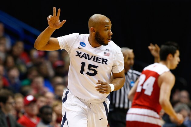 ST LOUIS, MO - MARCH 20: Myles Davis #15 of the Xavier Musketeers reacts after a basket in the first half against the Wisconsin Badgers during the second round of the 2016 NCAA Men's Basketball Tournament at Scottrade Center on March 20, 2016 in St Louis, Missouri.  (Photo by Jamie Squire/Getty Images)