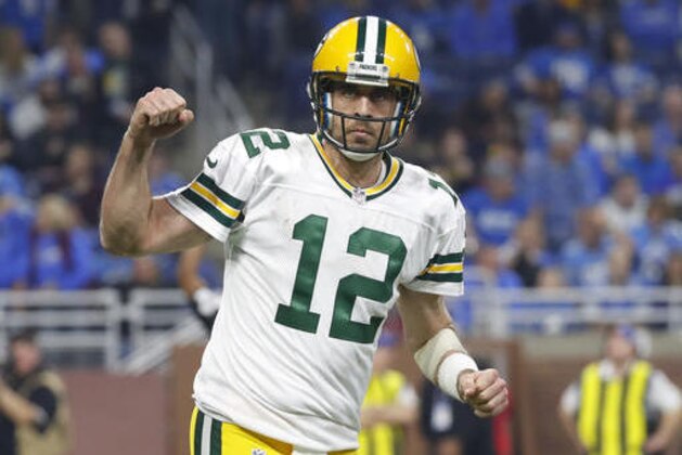 FILE  -  In this Sunday, Jan. 1, 2017 file photo, Green Bay Packers quarterback Aaron Rodgers reacts as he runs to the sideline during the second half of an NFL football game against the Detroit Lions in Detroit. Aaron Rodgers backed up his confidence-boosting “run-the-table” statement with a remarkable six-game run of quarterback play that helped get the Green Bay Packers in the playoffs. Winners of six straight games, Rodgers and the Packers hope to keep their hot streak going when they meet the New York Giants in an NFC playoff game on Sunday, Jan. 8, 2017. (AP Photo/Paul Sancya, File)