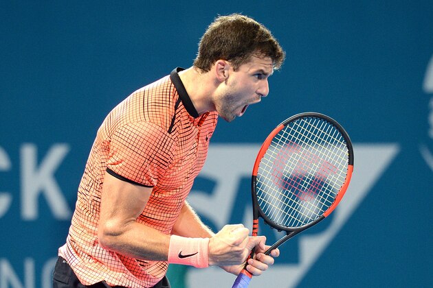 BRISBANE, AUSTRALIA - JANUARY 08:  Grigor Dimitrov of Bulgaria celebrates winning the first set against Kei Nishikori of Japan during the Men's Final on day eight of the 2017 Brisbane International at Pat Rafter Arena on January 8, 2017 in Brisbane, Australia.  (Photo by Bradley Kanaris/Getty Images)