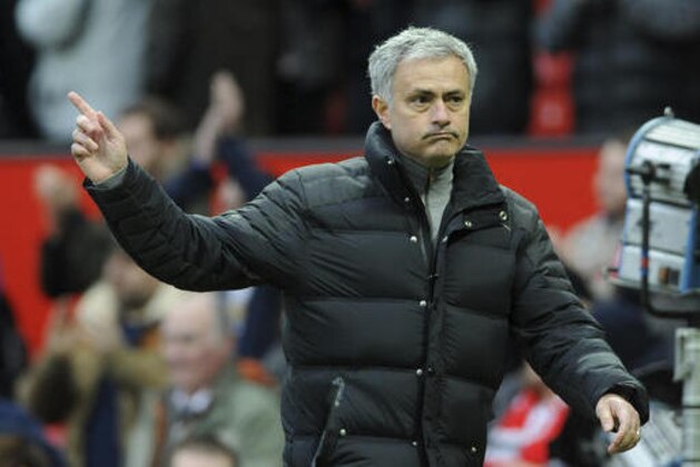 Manchester United's manager Jose Mourinho acknowledges the crowd as he walks from the pitch after the end of the English FA Cup Third Round match between Manchester United and Reading at Old Trafford in Manchester, England, Saturday, Jan. 7, 2017. United won the match 4-0. (AP Photo/Rui Vieira) Manchester United's manager Jose Mourinho acknowledges the crowd as he walks from the pitch after the end of the English FA Cup Third Round match between Manchester United and Reading at Old Trafford in Manchester, England, Saturday, Jan. 7, 2017. United won the match 4-0. (AP Photo/Rui Vieira)