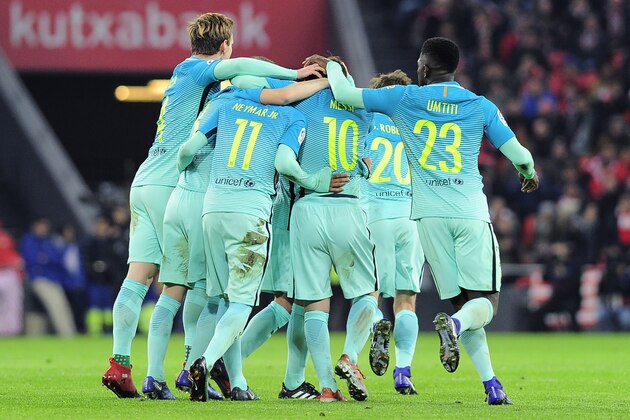 Barcelona's players celebrate after Argentinian forward Lionel Messi (C) scored his team's first goal during the Spanish Copa del Rey (King's Cup) round of 16 first leg football match Athletic Club Bilbao VS FC Barcelona at the San Mames stadium in Bilbao on January 5, 2017. / AFP / ANDER GILLENEA        (Photo credit should read ANDER GILLENEA/AFP/Getty Images)
