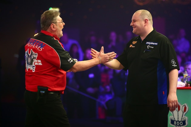 FRIMLEY, ENGLAND - JANUARY 08:  Martin Adams of England (L) shakes hands with Ryan Joyce of England (R) after he wins their Men's First Round match against  on Day Two of the BDO Lakeside World Professional Darts Championships at the Lakeside Country Club on January 8, 2017 in Frimley, England.  (Photo by Jordan Mansfield/Getty Images)