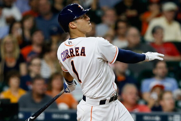 HOUSTON, TX - JUNE 20:  Carlos Correa #1 of the Houston Astros hits a home run in the sixth inning against the Los Angeles Angels of Anaheim at Minute Maid Park on June 20, 2016 in Houston, Texas.  (Photo by Bob Levey/Getty Images)