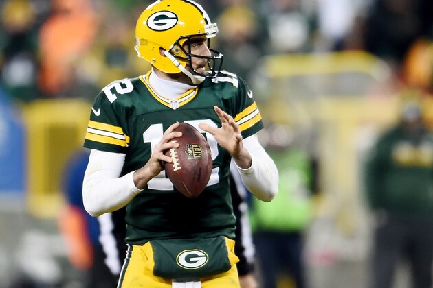 GREEN BAY, WI - JANUARY 08:  Aaron Rodgers #12 of the Green Bay Packers drops back to pass in the second quarter during the NFC Wild Card game against the New York Giants at Lambeau Field on January 8, 2017 in Green Bay, Wisconsin.  (Photo by Stacy Revere/Getty Images)