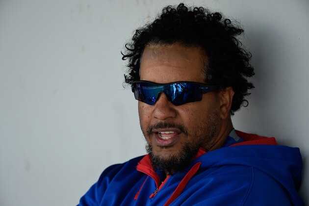 MESA, AZ - MARCH 11:  Hitting instructor Manny Ramirez of the Chicago Cubs sits in the dugout durting the game against the Los Angeles Dodgers on March 11, 2015 in Mesa, Arizona.  (Photo by Lisa Blumenfeld/Getty Images)